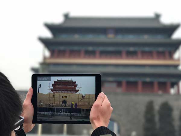 New realities 'rebuild' Beijing's lost city gates