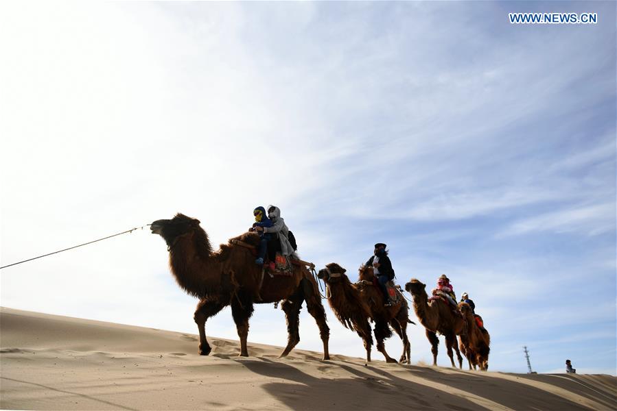 Mingsha Sand Mountain scenery zone in Dunhuang attracts tourists