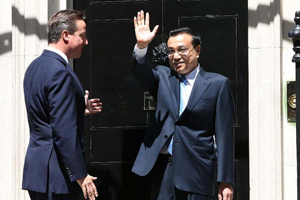 China, Britain vow to enhance co-op in finance, RMB business