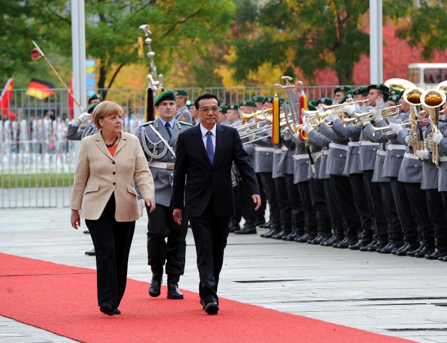 Chinese premier attends welcoming ceremony held by Merkel