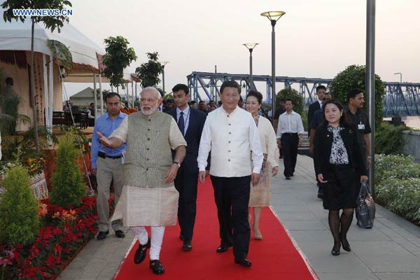 Xi visits Modi's home state, extends birthday wishes