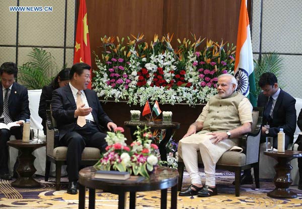 Xi visits Modi's home state, extends birthday wishes