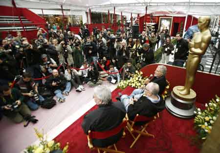 Oscar telecast director Louis Orvitz (L), telecast producer Gil Cates (C) and Academy of Motion Picture Arts and Sciences president Sid Ganis face photographers during a news conference before the 80th annual Academy Awards in Hollywood February 22, 2008. The Oscars will be presented February 24, 2008.