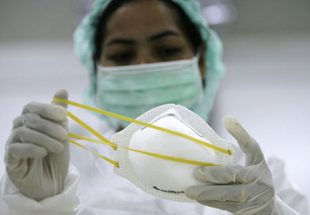 Masks production increased in Asia as flu spreads