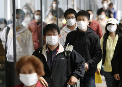 Japan confirms fourth case of swine flu