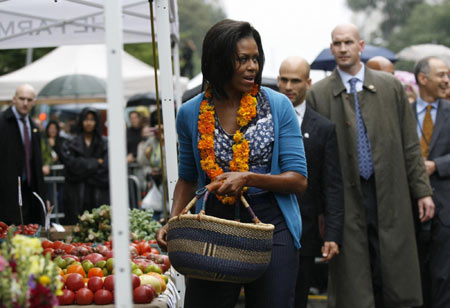 Michelle Obama attends market opening