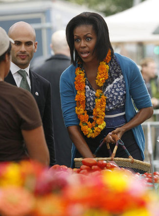 Michelle Obama attends market opening