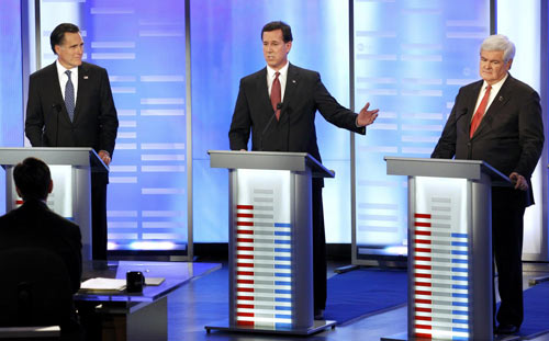 Rivals fail to take Romney down in NH debate