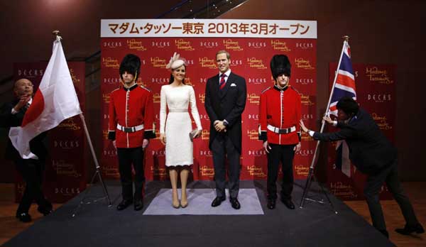 Wax figures of UK Prince William and Catherine