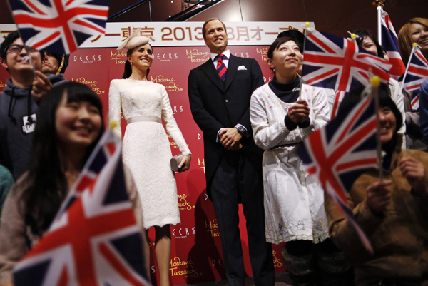 Wax figures of UK Prince William and Catherine