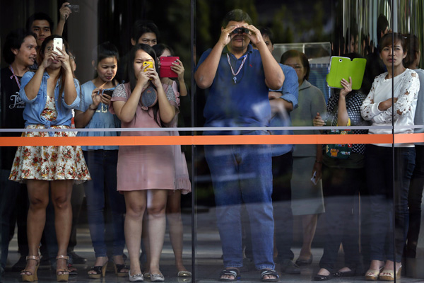 Thai protesters target businesses linked to PM