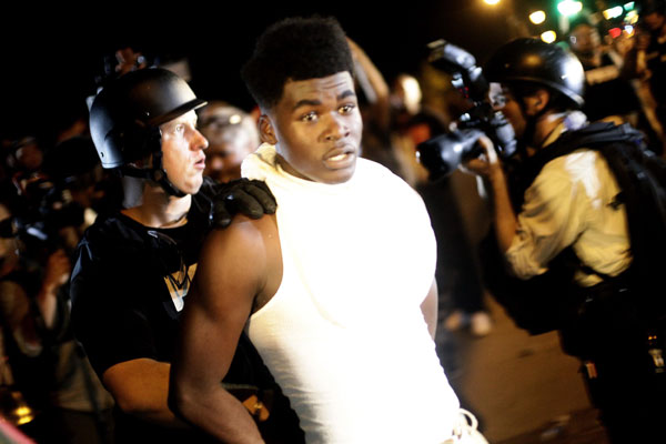 Police move against protesters as calm dissolves in Missouri