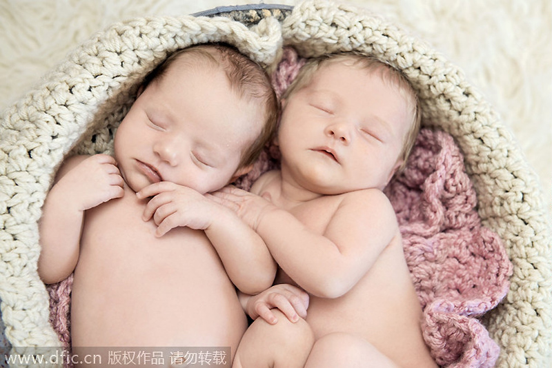 Sleeping newborns photographed in adorable poses