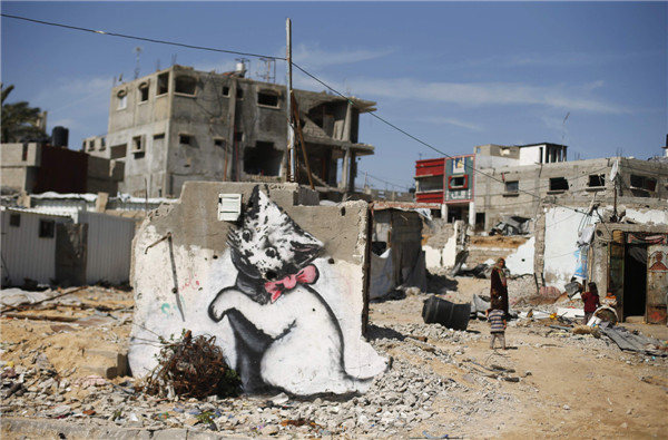 British street artist paints works in Gaza