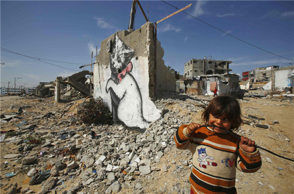 British street artist paints works in Gaza