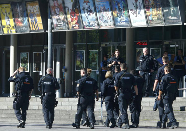 Gunman takes hostages in German cinema, is shot dead by police