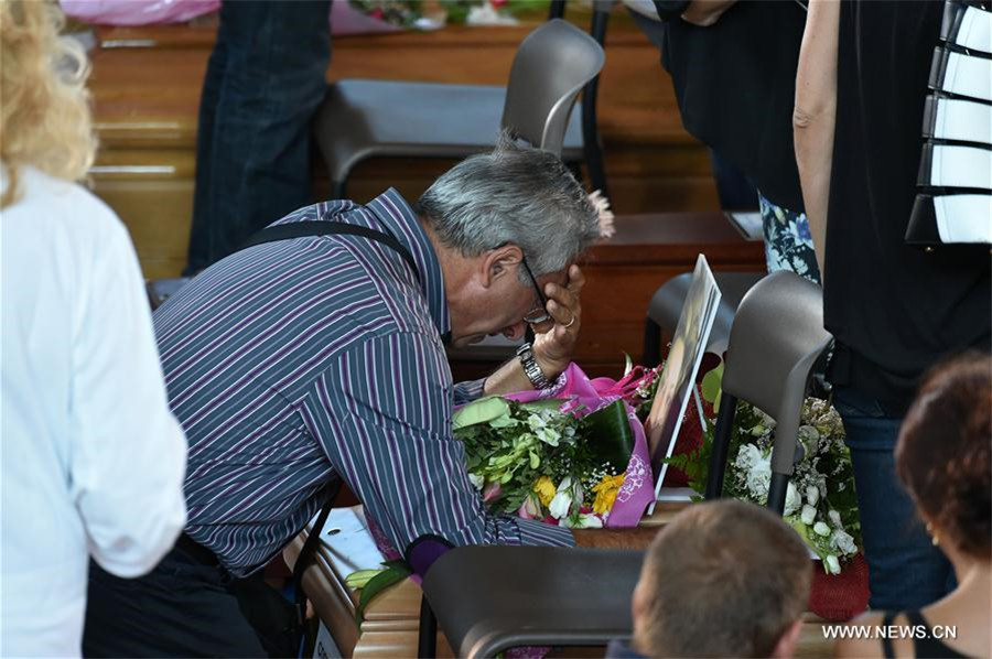 Relatives mourn for earthquake victims in Italy