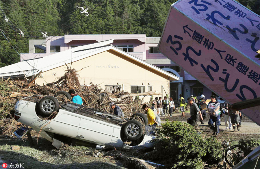 Typhoon kills 9 in Japan's old people's home as toll hits 11