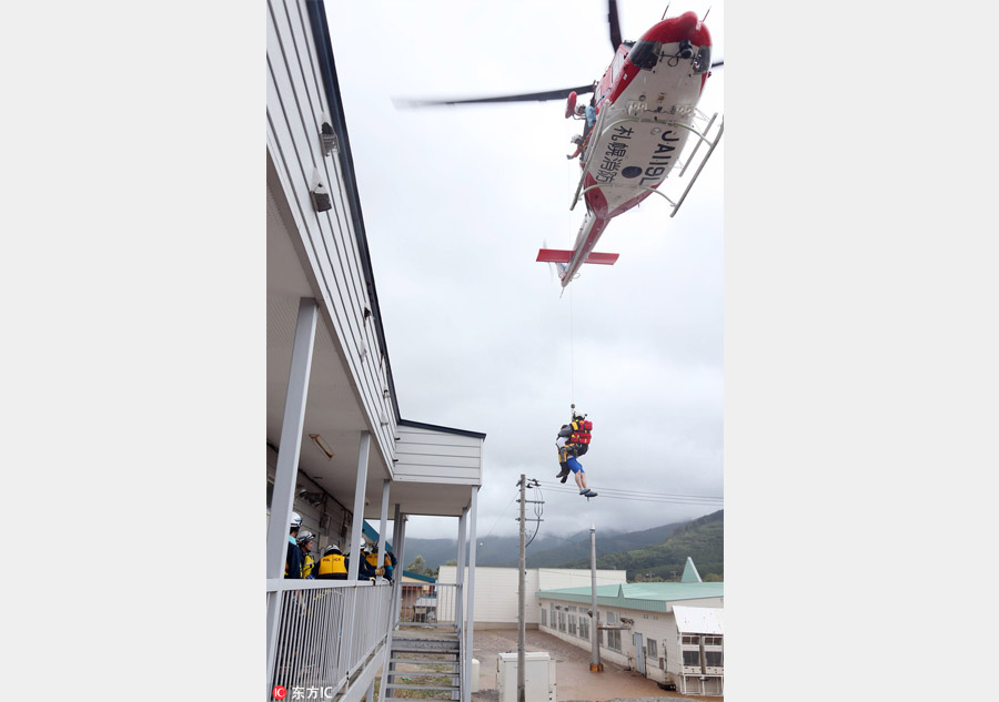 Typhoon kills 9 in Japan's old people's home as toll hits 11