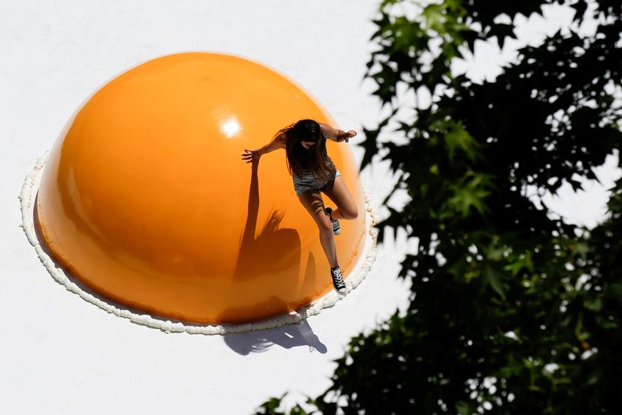 Streets are alive with giant fried eggs in Santiago