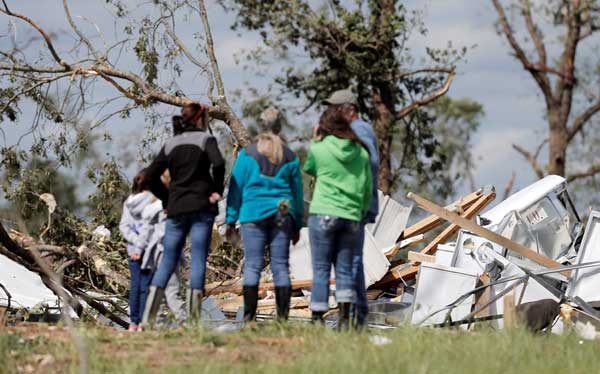 Tornadoes, storms kill 11 in US South