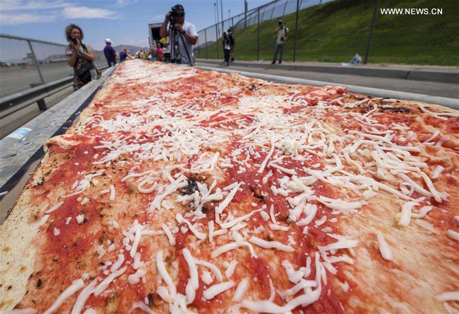 World's longest pizza breaks Guinness Records in US